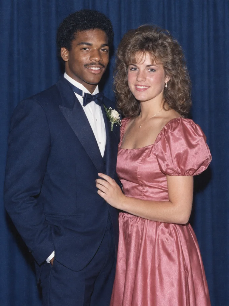 Satin, a boutonnière and that slightly awkward formal-photo pose.